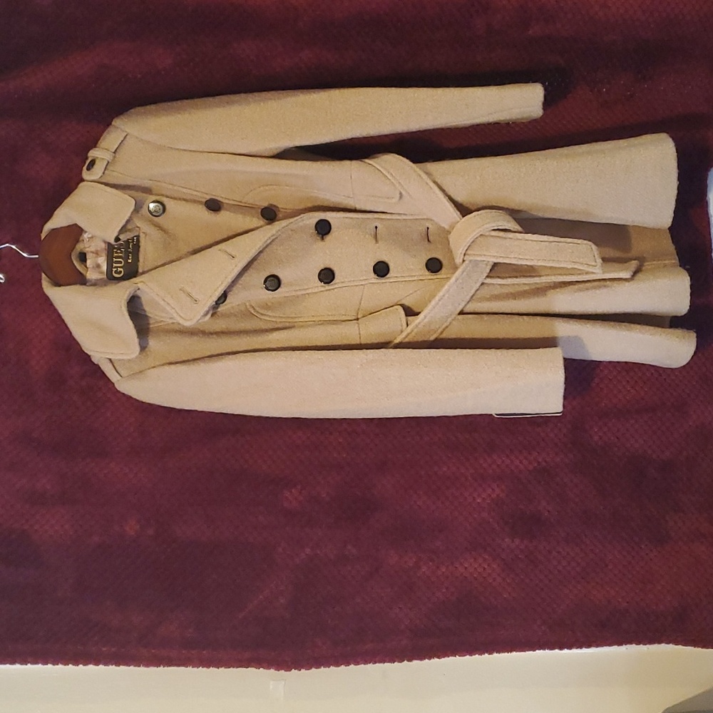 Wool/Polyester blend (70/30) lined, beautiful coat for East coast weather.